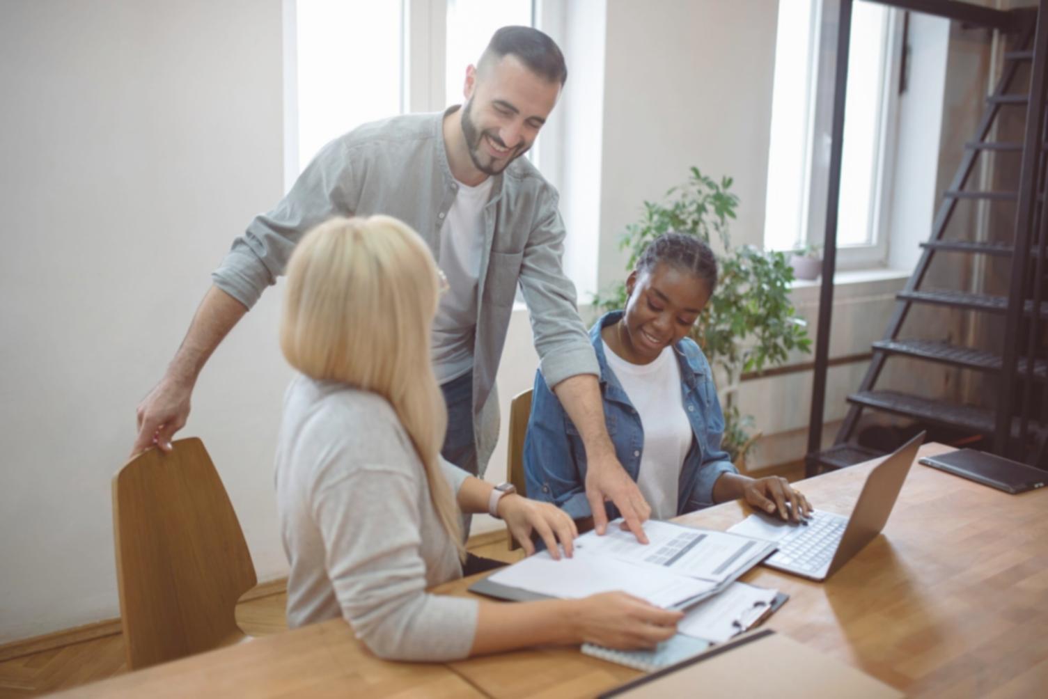 Professional meeting room with financial charts and Korean market analysis displayed on screens